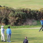 Group teeing off the 1st hole at st andrews new course