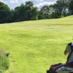 Walking up the 18th fairway at prestwich golf club Manchester