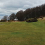 teeing off in golf waterproofs