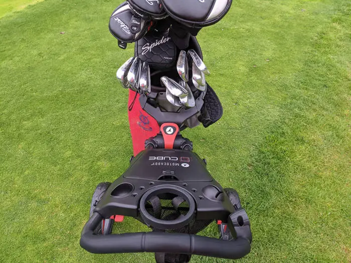 Handle and accessory compartment of the motocaddy cube golf trolley