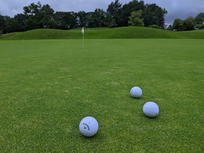 callaway supersoft golf balls on the green