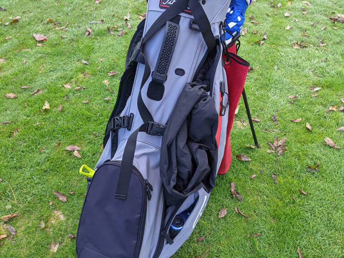 golf clothing packed in a golf bag